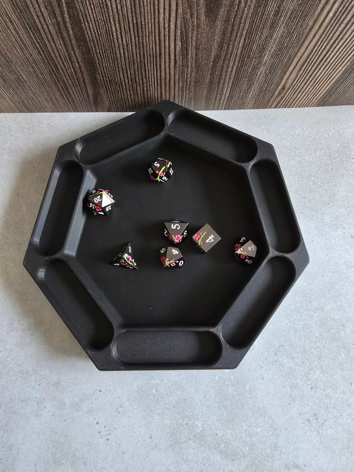 Moonhollow Keep black hexagonal dice tray with dice