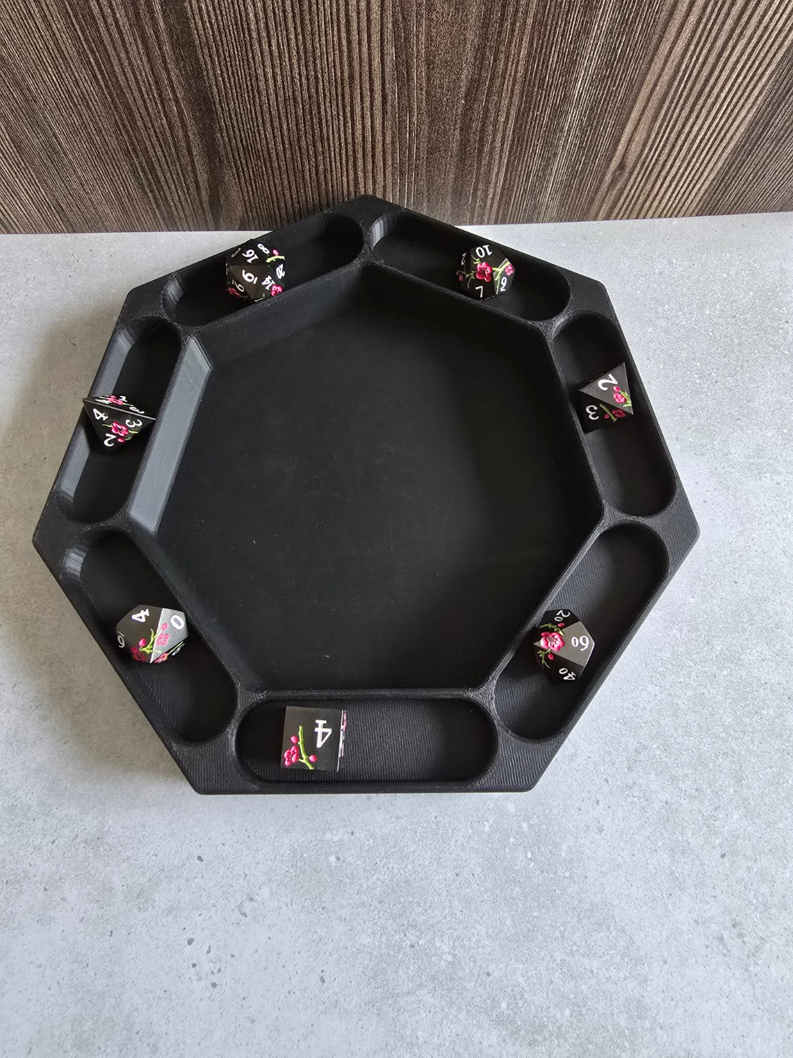 Moonhollow Keep black hexagonal dice tray with dice