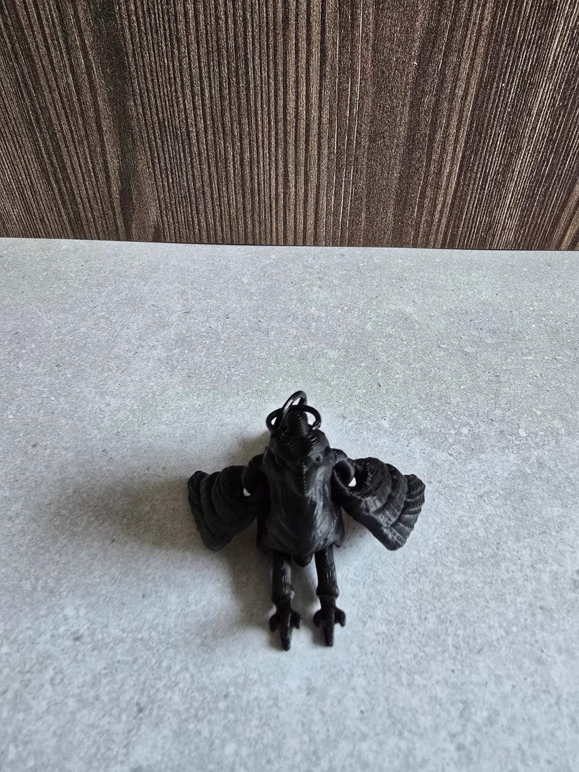 Pocket Familiar Raven back view