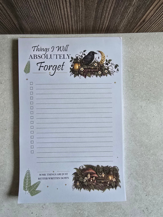 Front view of Things I Will Absolutely Forget raven checklist notepad with woodland illustrations