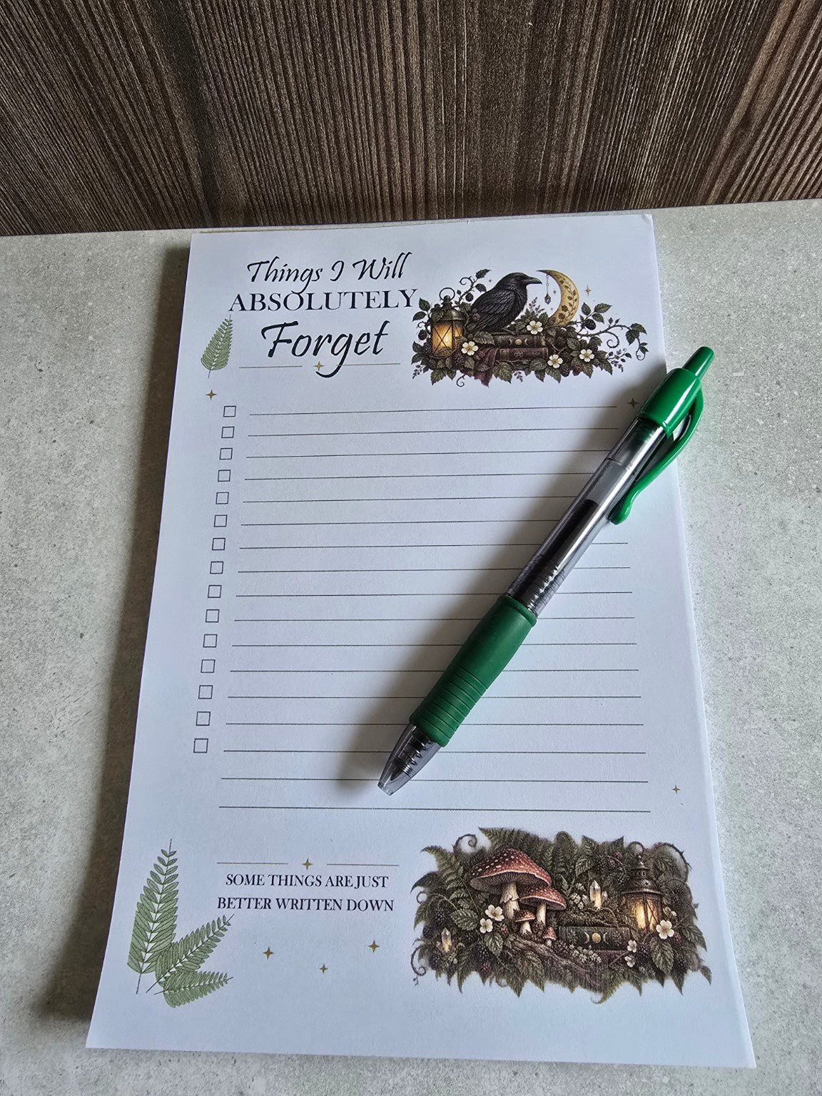Raven checklist notepad shown with green pen for size reference