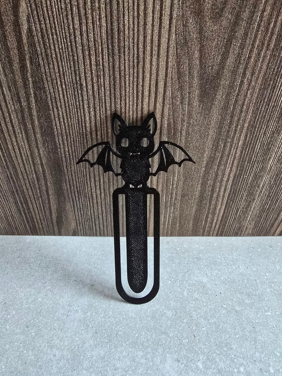 Tiny Familiar Bat Bookmark standing upright