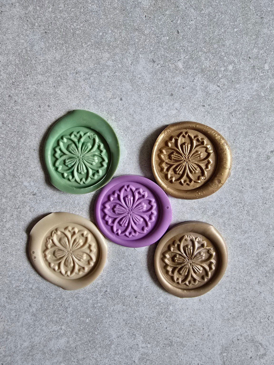 Packaged handmade floral mandala self-adhesive wax seals.