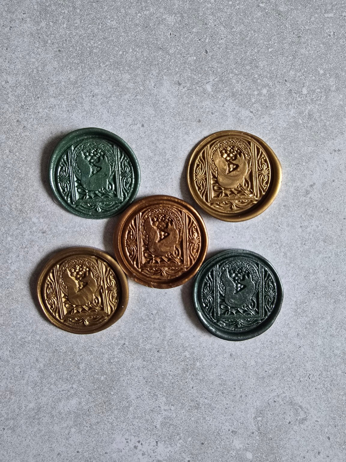 Packaged handmade ornate fox self-adhesive wax seals.
