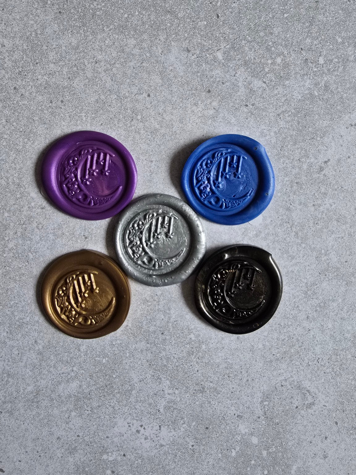 Packaged handmade moon and stars self-adhesive wax seals.