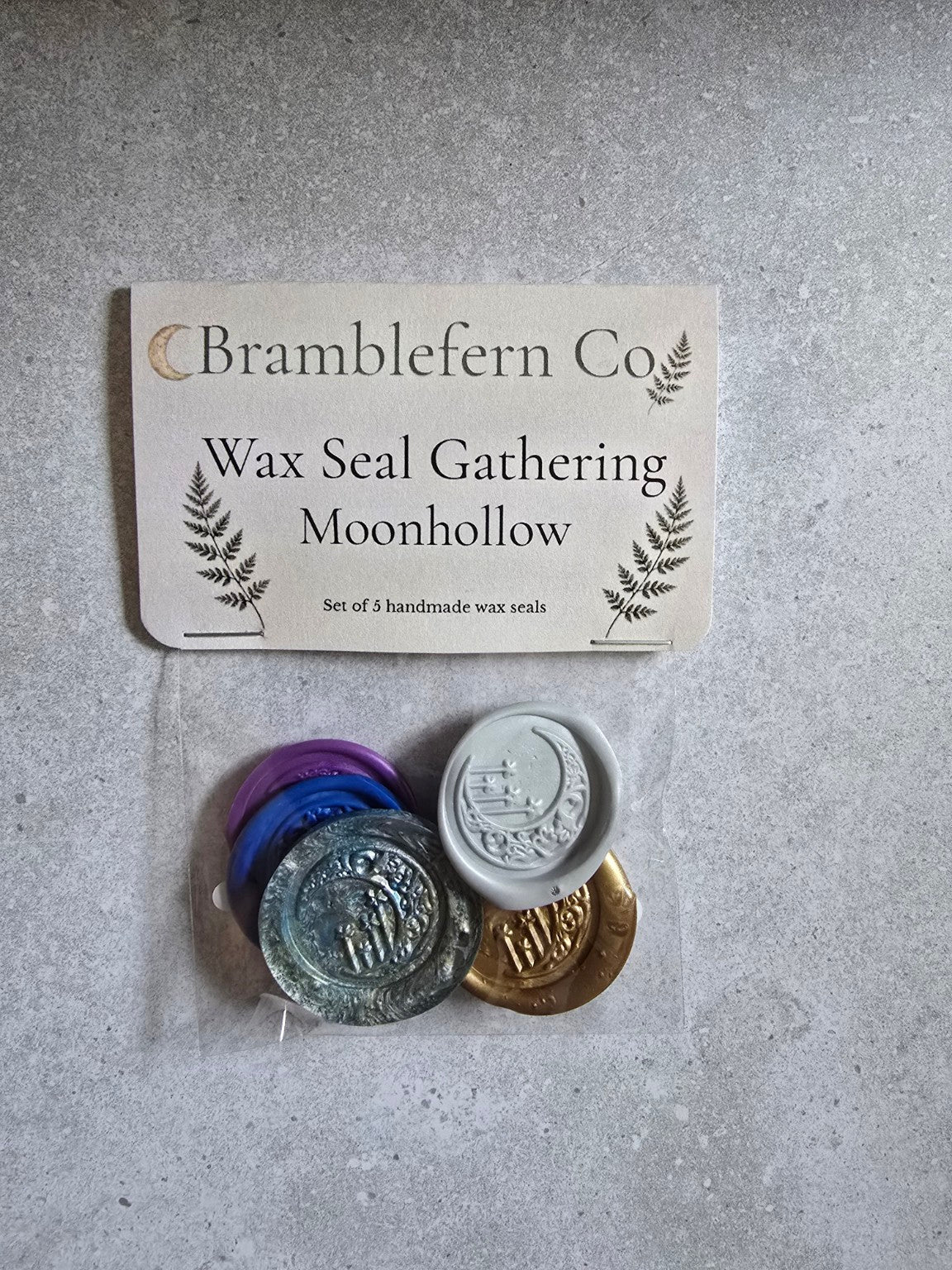 Moonhollow handmade self-adhesive wax seals packaged as a set of five.