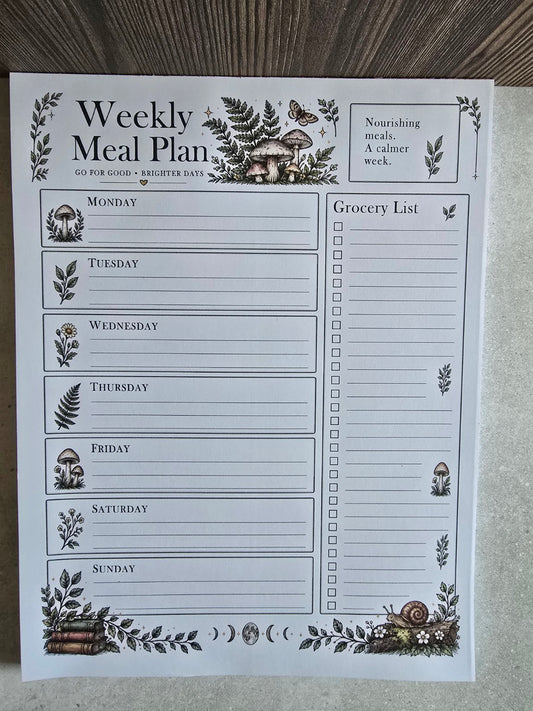 Front view of full-size Bramblefern Weekly Meal Planner notepad with seven-day meal plan, grocery list and woodland mushrooms
